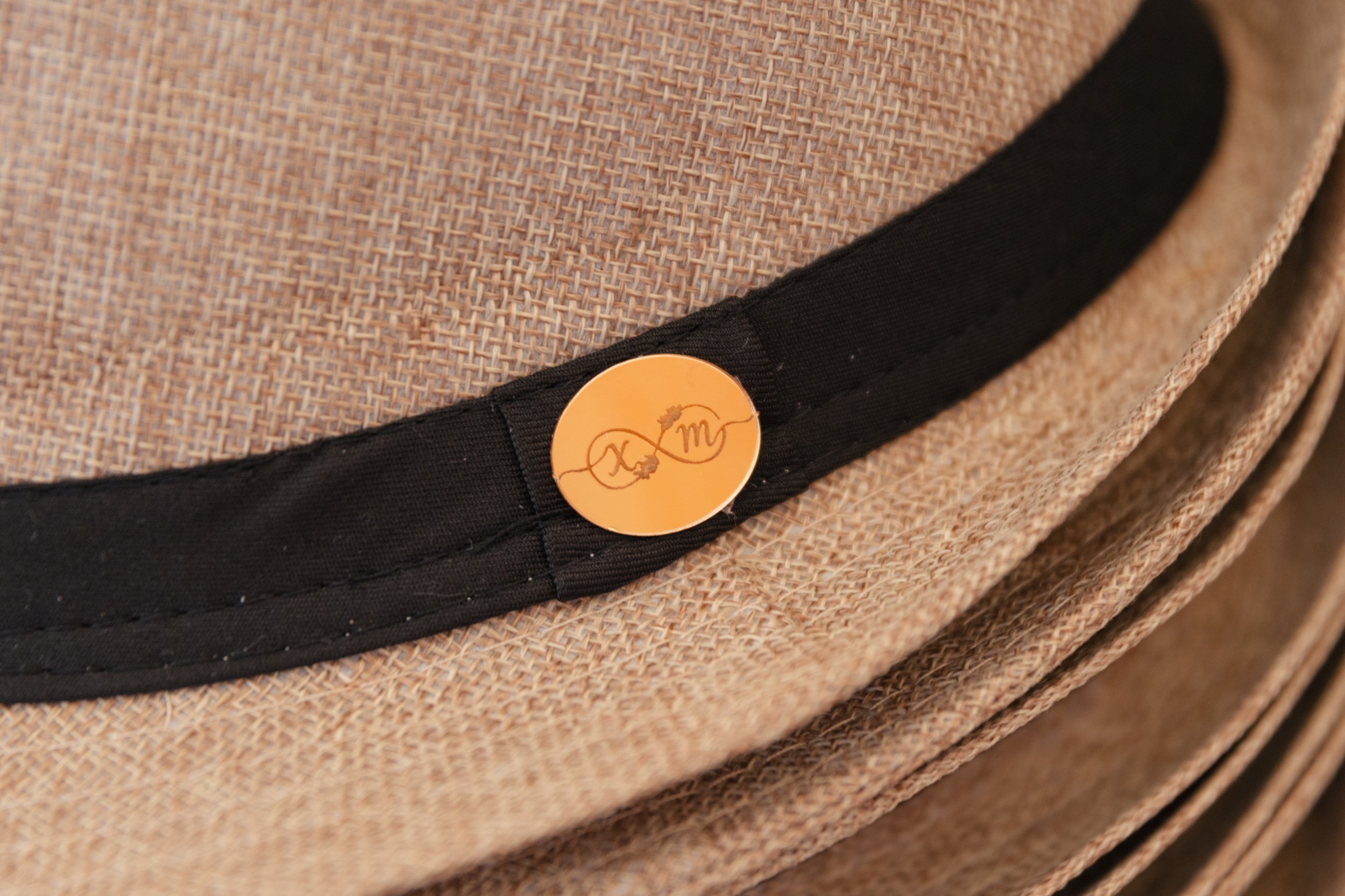 Wedding detail — X&M monogram, August 2025